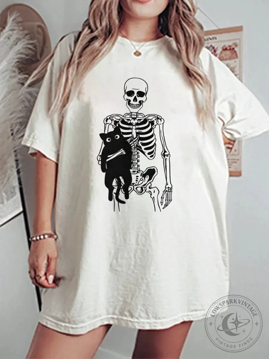 Vintage Skeleton Holding Black Cat Graphic Oversized T-Shirt